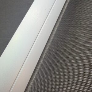 Charcoal brush strip on a D30 roller blind bottom rail