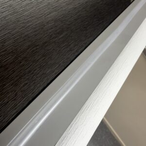 Clear silencer tube in the back of a D30 roller blind bottom rail